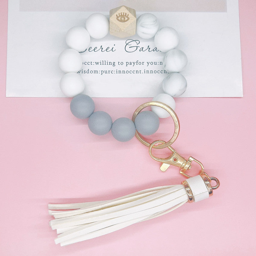 Llavero bohemio de la muñeca de la borla del cuero al por mayor del silicón